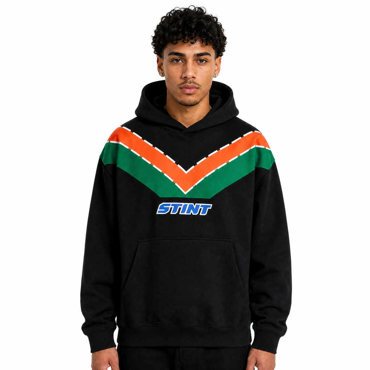 Rotary Hoodie by STINT GEAR worn front view. Orange and green 787B livery on black.