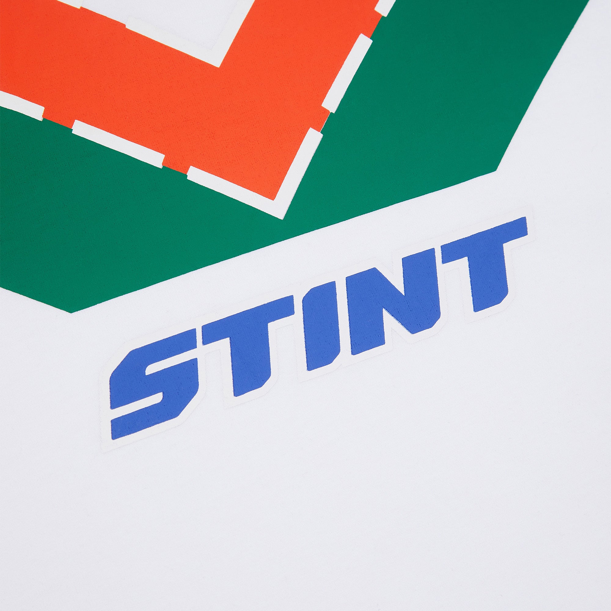 Rotary Tee by STINT GEAR. Close detail on white. Motorsport livery apparel.